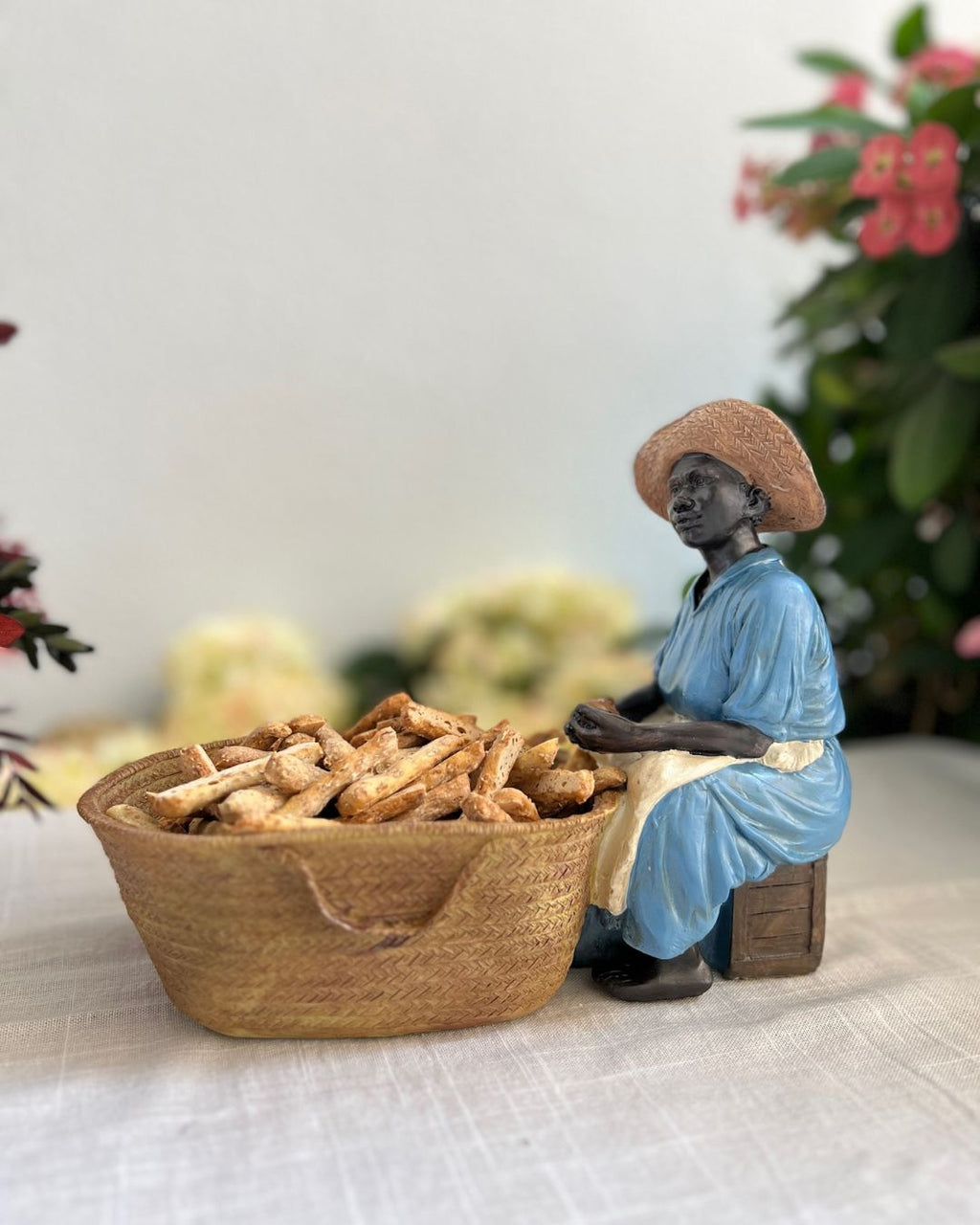 Figura con cesta