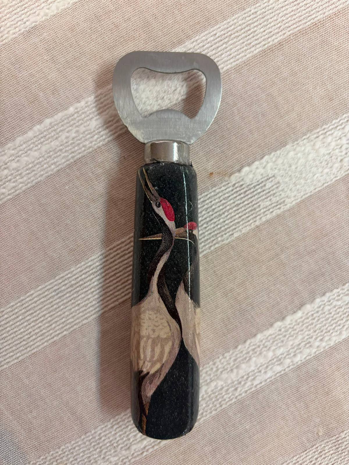 Abridor Pájaro Negro