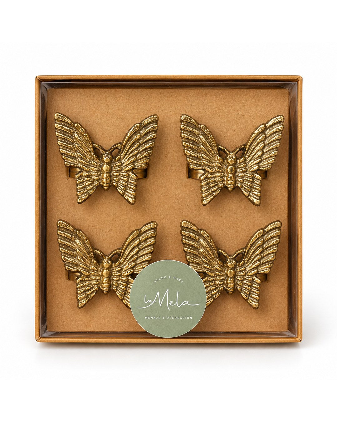 Pack de cuatro servilleteros Mariposa dorados en su caja de La Mela