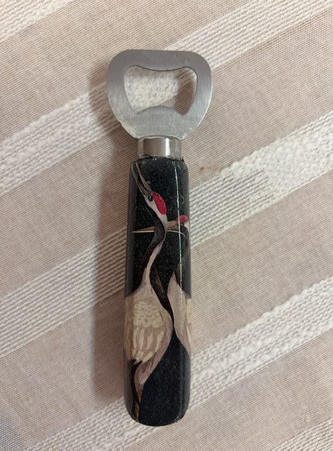 Abridor Pájaro Negro