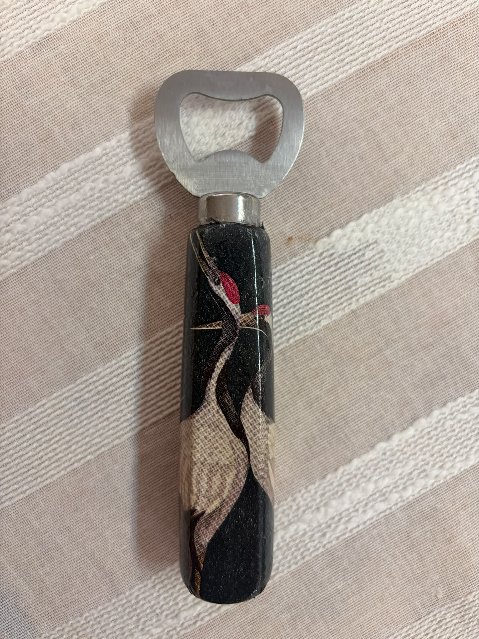 Abridor Pájaro Negro